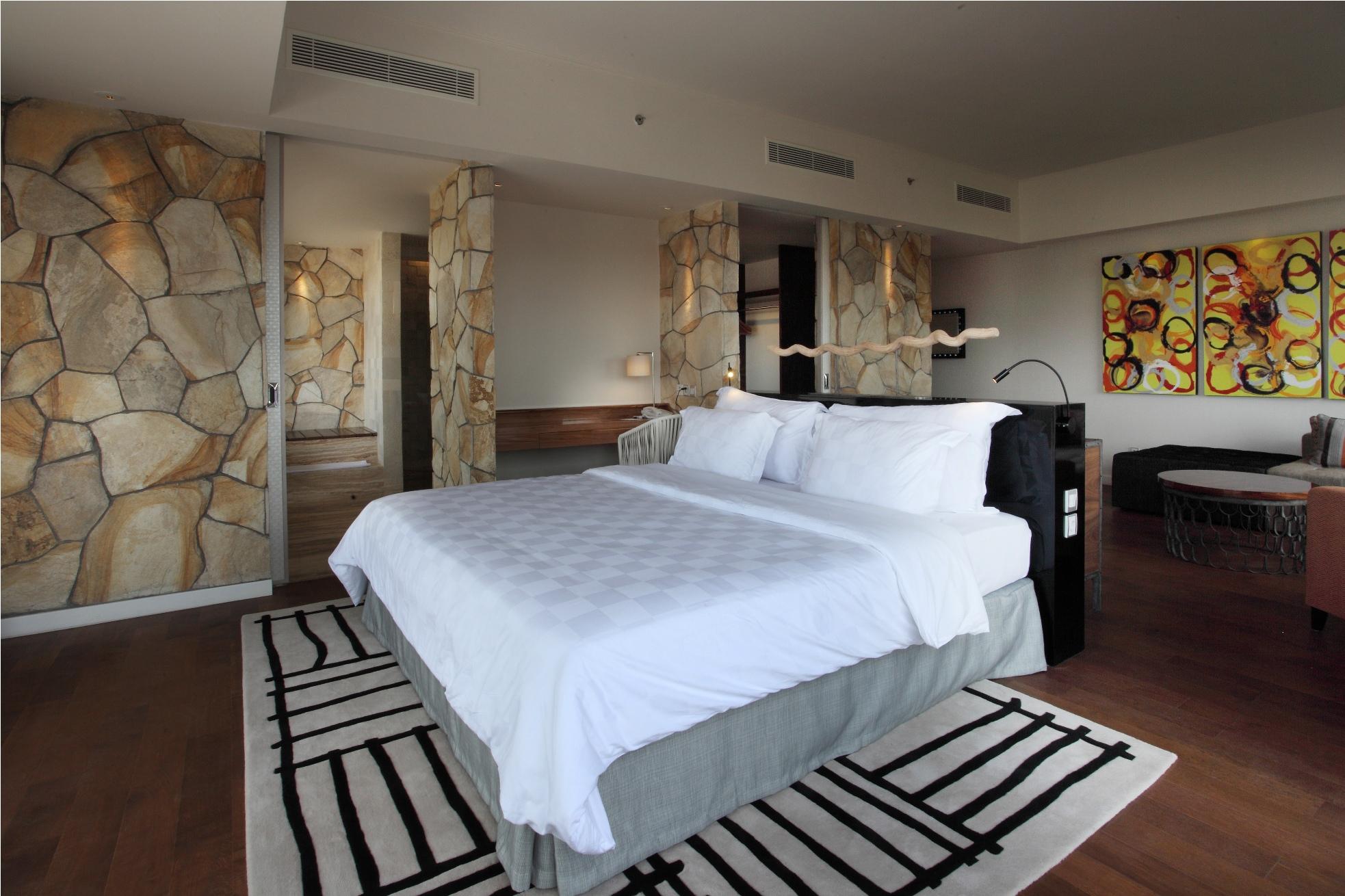 Ts Suites Seminyak Exterior foto A bedroom at the hotel